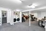 Finished basement area featuring carpet and washing machine and dryer