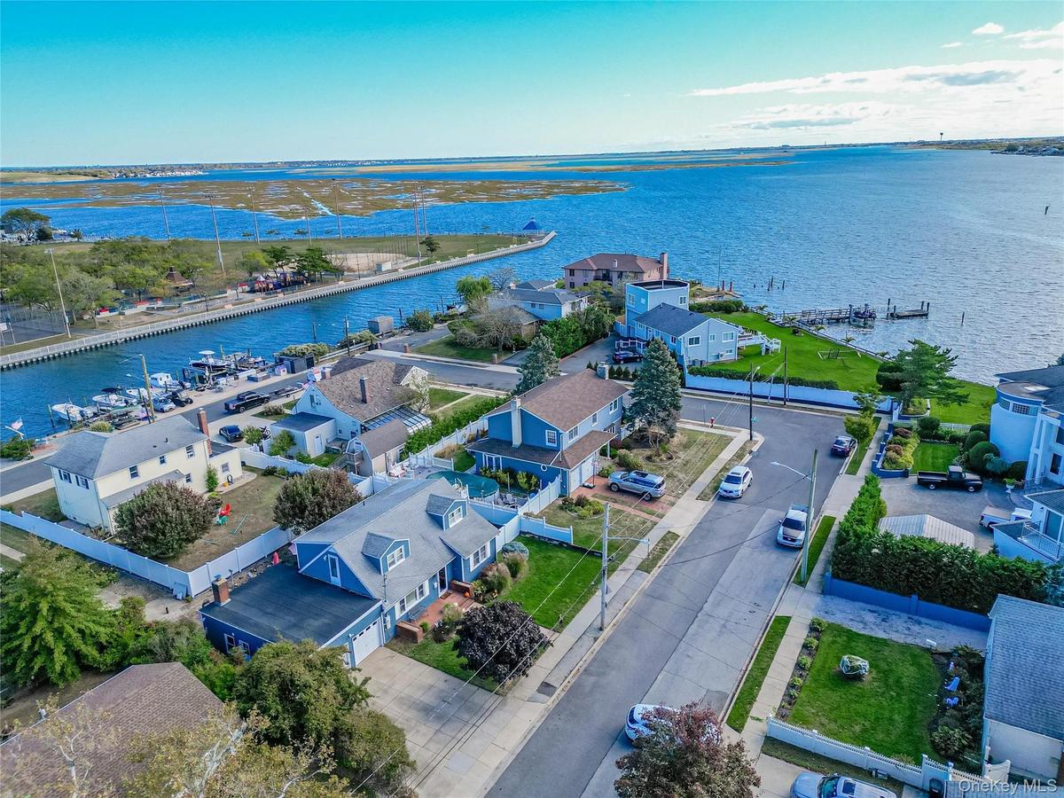 Aerial view of residential area with a large body of water