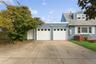 Garage with concrete driveway