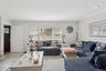 Living area featuring recessed lighting, crown molding, and light wood finished floors