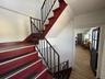 Staircase with wood finished floors