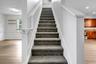 Stairs leading to bedrooms