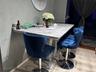Dining area featuring tile patterned floors and baseboards