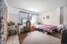Bedroom with light tile patterned floors