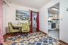 Dining area featuring dark wood-type flooring
