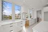 Kitchen featuring oversized windows with panoramic views