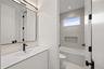 Bathroom featuring LED Backlit Vanity Lighting
