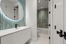 Bathroom featuring LED Backlit Vanity Lighting