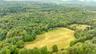 Drone / aerial view of a heavily wooded area