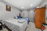 Bedroom featuring light colored carpet, recessed lighting, a textured ceiling, and wallpapered walls