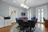 Office space featuring french doors, light wood-type flooring, and recessed lighting