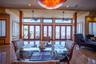 Dining space with a ceiling fan, recessed lighting, radiator, french doors, and a towering ceiling