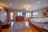 Bedroom with recessed lighting and light wood finished floors