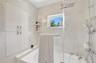Marble Tiled from floor to ceiling