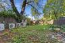 View of fenced backyard