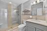 Private bathroom in second bedroom.