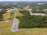 Aerial overview of property's location with a forest