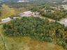 View of property location with a forest