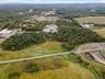Aerial overview of property's location with a forest