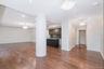 Expansive living, dining, and kitchen entertaining space.
