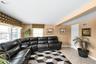 Second living room area featuring view on to the pool