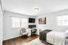 Bedroom featuring dark wood-style floors