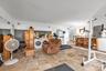 Living area featuring washer and clothes dryer
