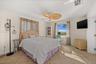 Primary Bedroom with Direct access to the patio and pool