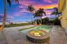 Covered lanai overlooking the pool and river