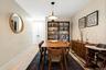 Dining space featuring light wood-style floors and baseboards