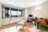 Home office with wood finished floors and baseboards