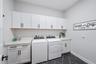Laundry Room with Ample Storage Cabinetry