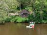 View of subject property featuring a nearby body of water