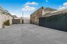 View of fenced private Back Yard