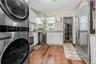 Spacious Kitchen with and stacked washer / dryer which can be moved to the basement.