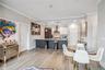 Dining room featuring light hardwood / wood-style floors and ornamental molding