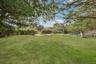 Generous Outdoor Grounds. Lot size can support Tennis Court.
