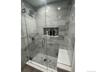 Bathroom featuring a stall shower