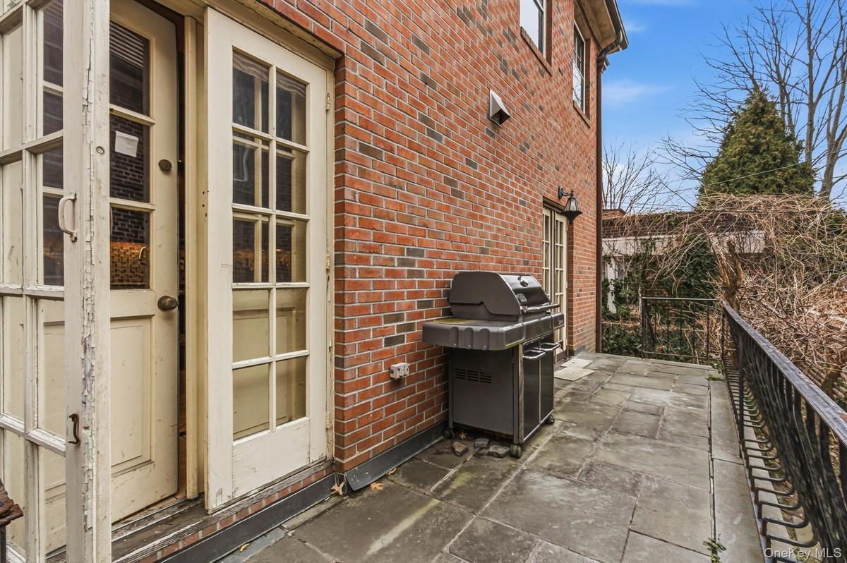 View of patio featuring area for grilling
