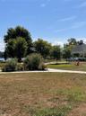 View of grassy yard featuring a gazebo