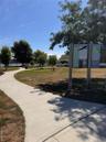 View of home's community featuring a yard