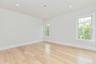 Spare room with light wood-style flooring and recessed lighting