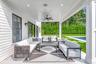 View of patio with ceiling fan, an outdoor pool, and outdoor lounge area