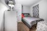 Bedroom featuring carpet floors