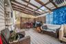 Wooden terrace featuring outdoor lounge area and a pergola