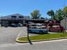 Highly visible industrial asset with prominent frontage and dedicated parking field.Strategic positioning along a well-traveled commercial corridor.