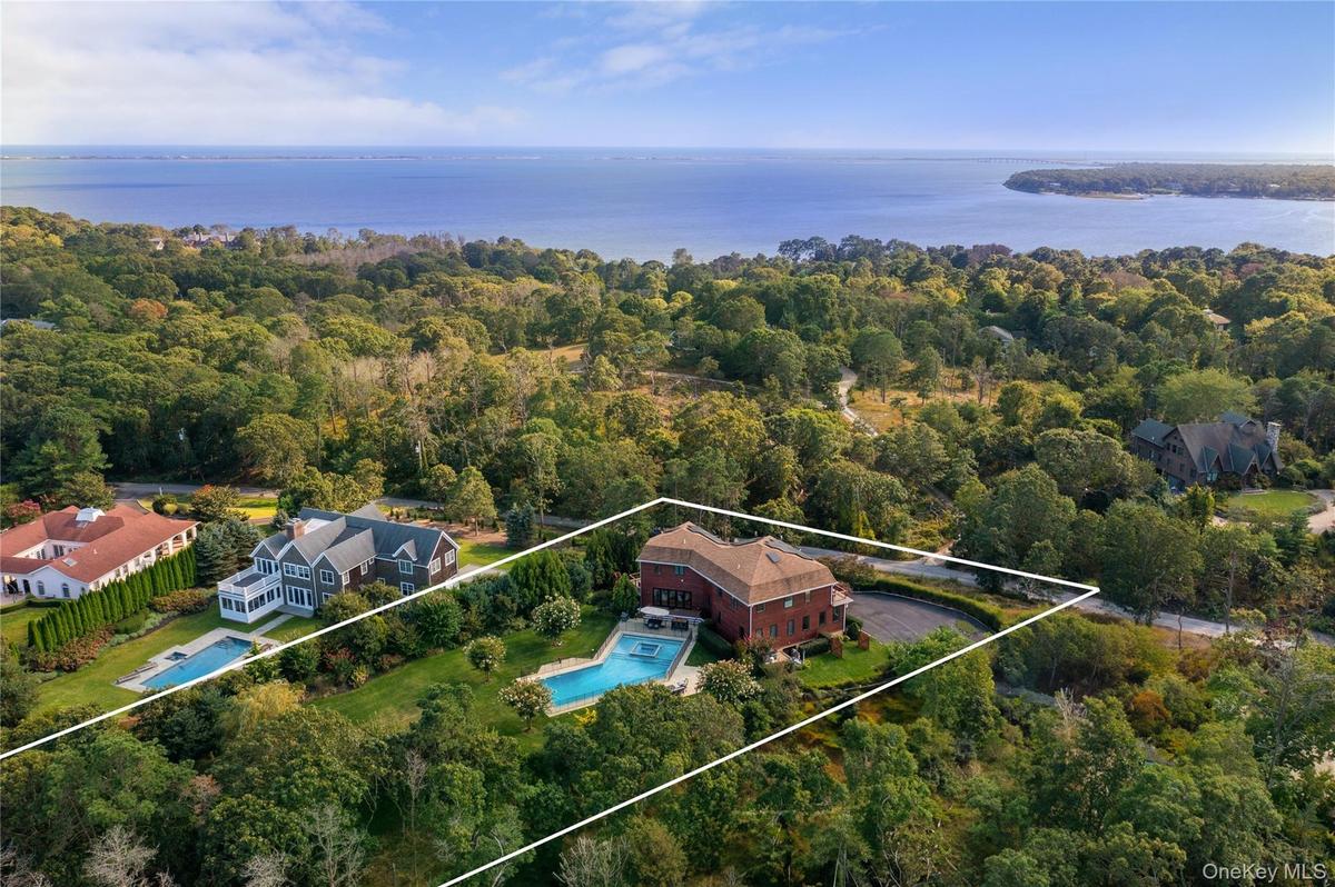Nestled on a pristine acre in Shinnecock Hills