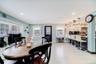 Step into a home where the entrance unfolds into a stunning, open-concept kitchen.
