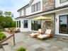 View of patio with an outdoor living space
