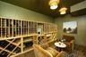 Wine room featuring wood finished floors